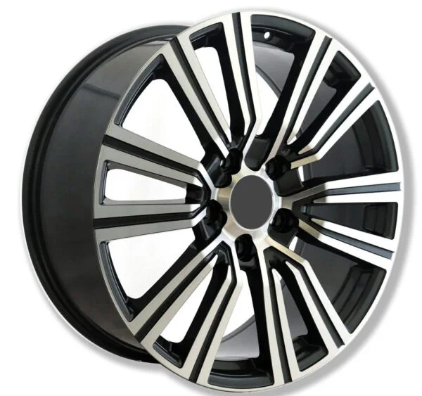 A bold, multi-spoke black and silver alloy car wheel rim for the LEXUS LX600, shown angled on a white background.