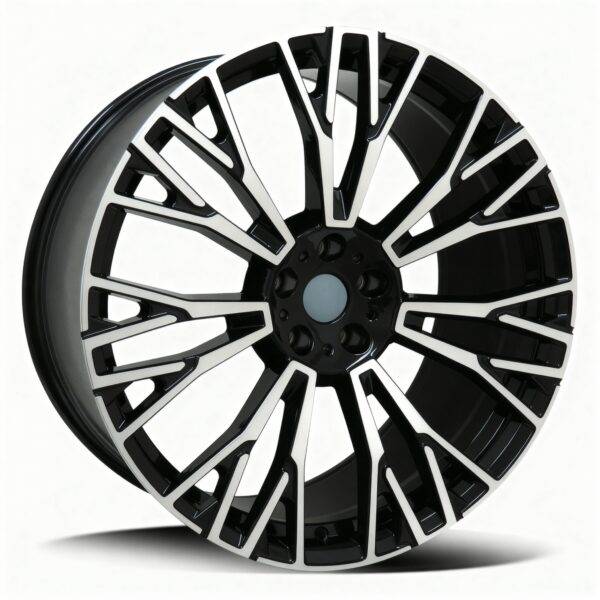 BMW X5 X6 black and silver alloy wheel with an intricate, geometric spoke design—perfect for the BMW INDIVIDUAL X5 X6—is displayed against a white background.